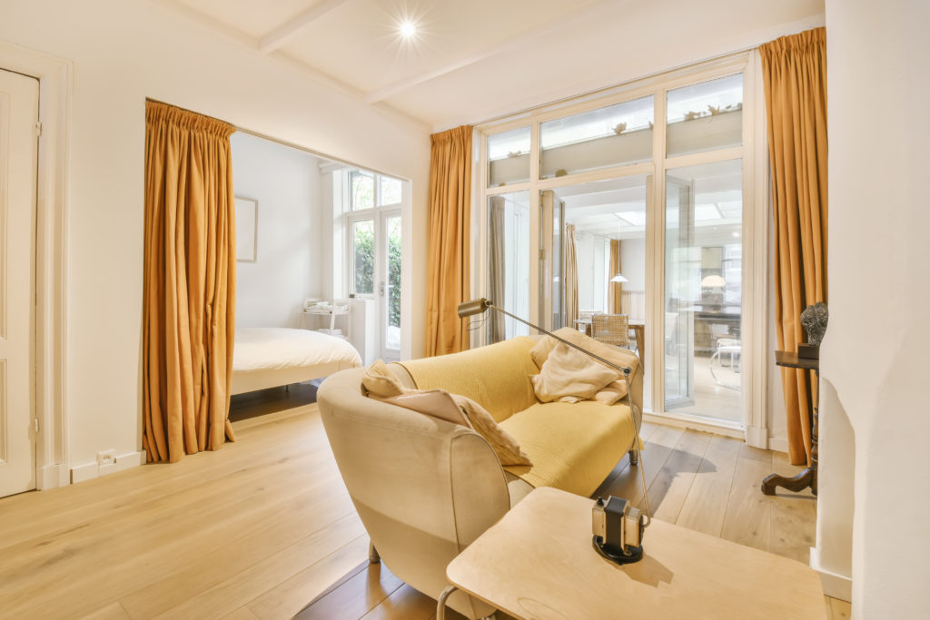 Stylish living room with soft decorative huge sofa