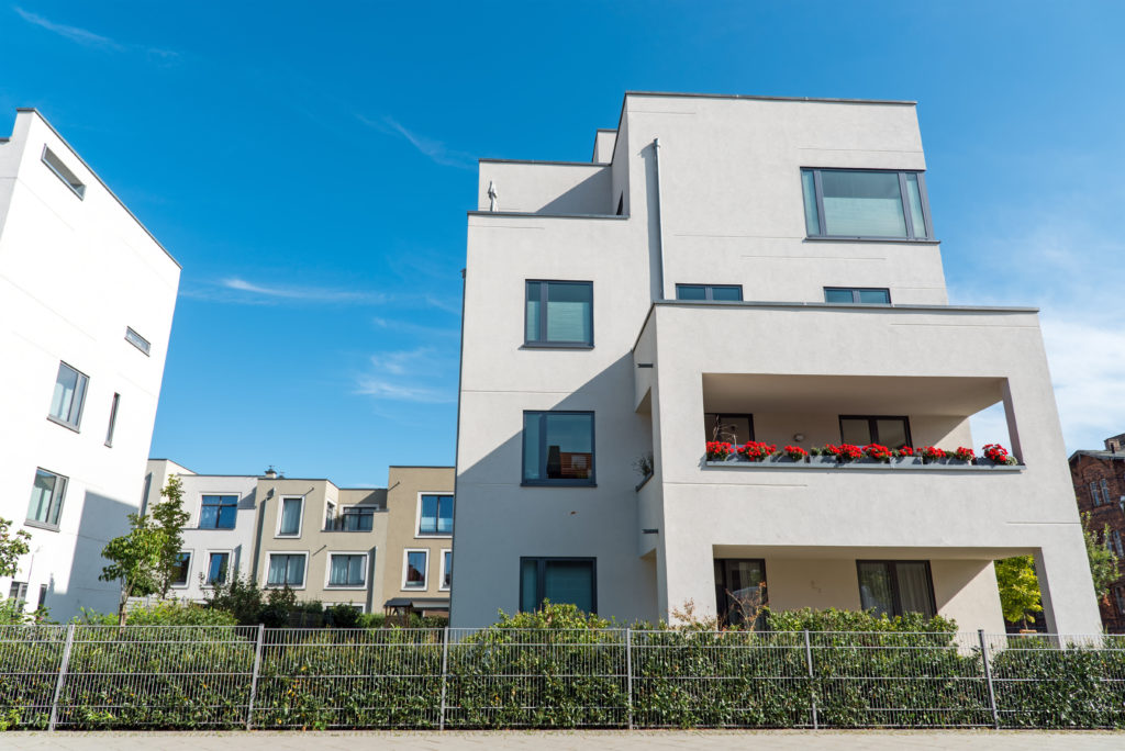 white-modern-houses-in-front-of-a-blue-sky-2025-03-09-03-37-06-utc